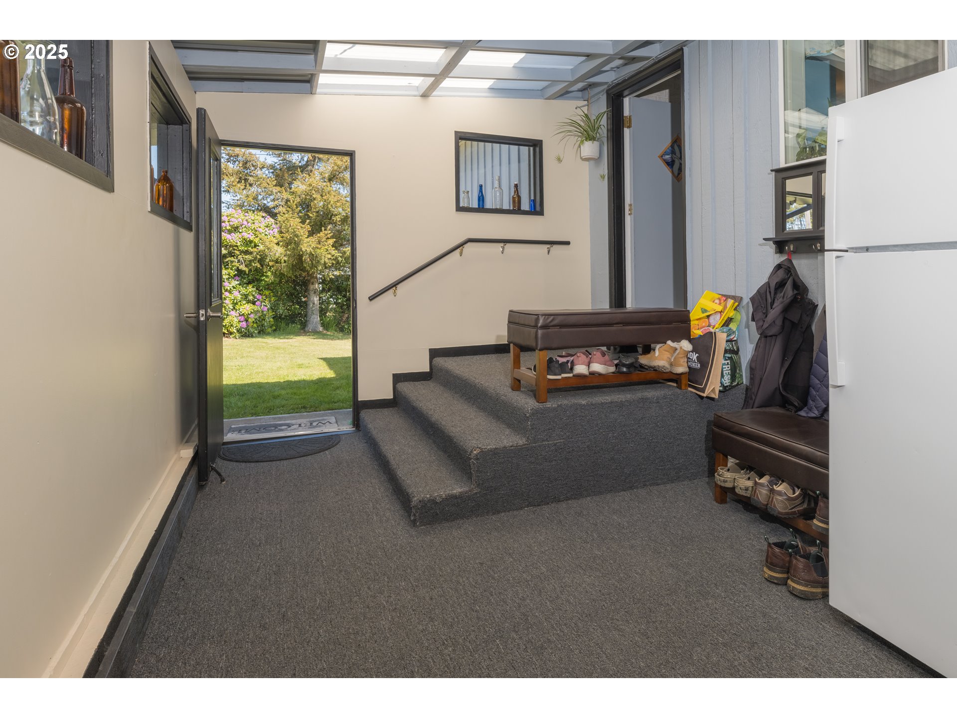 90431 Lewis Road Warrenton, OR 97146 - Photo 5 of 26 a living room with furniture and a window