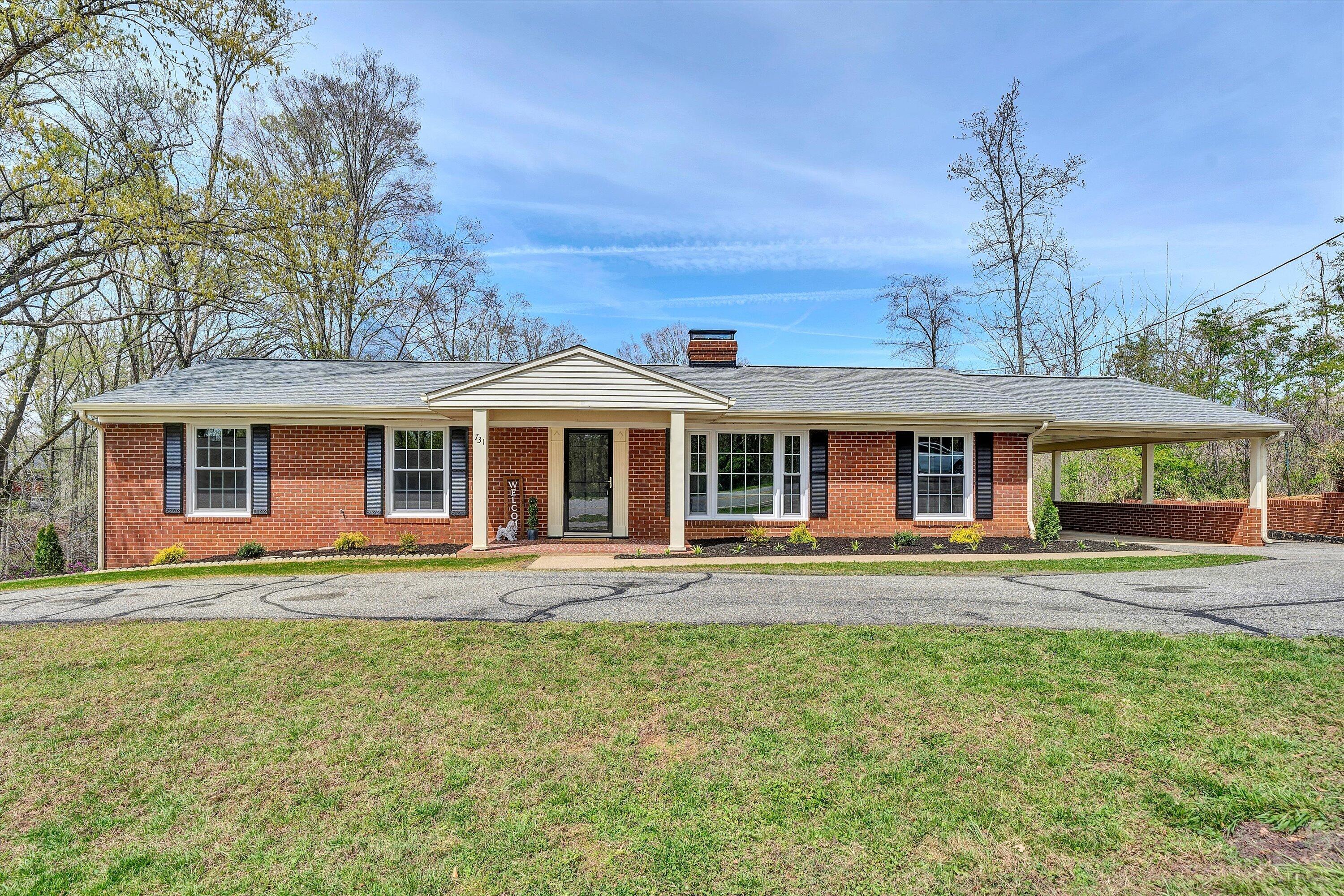 front view of a house with a yard