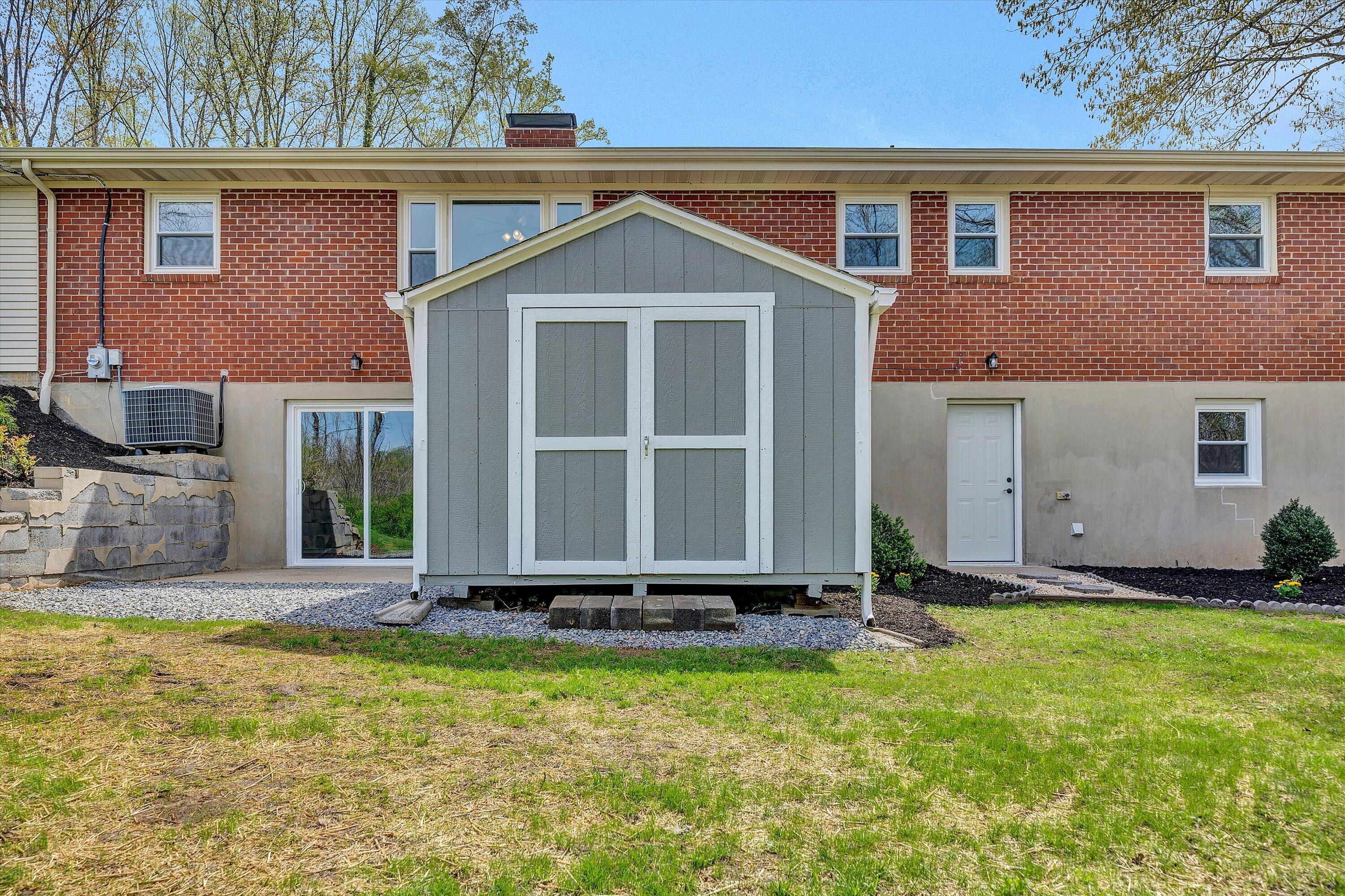 731 Bassett Heights Road Bassett, VA 24055 - Photo 36 of 45 a front view of a house with a yard