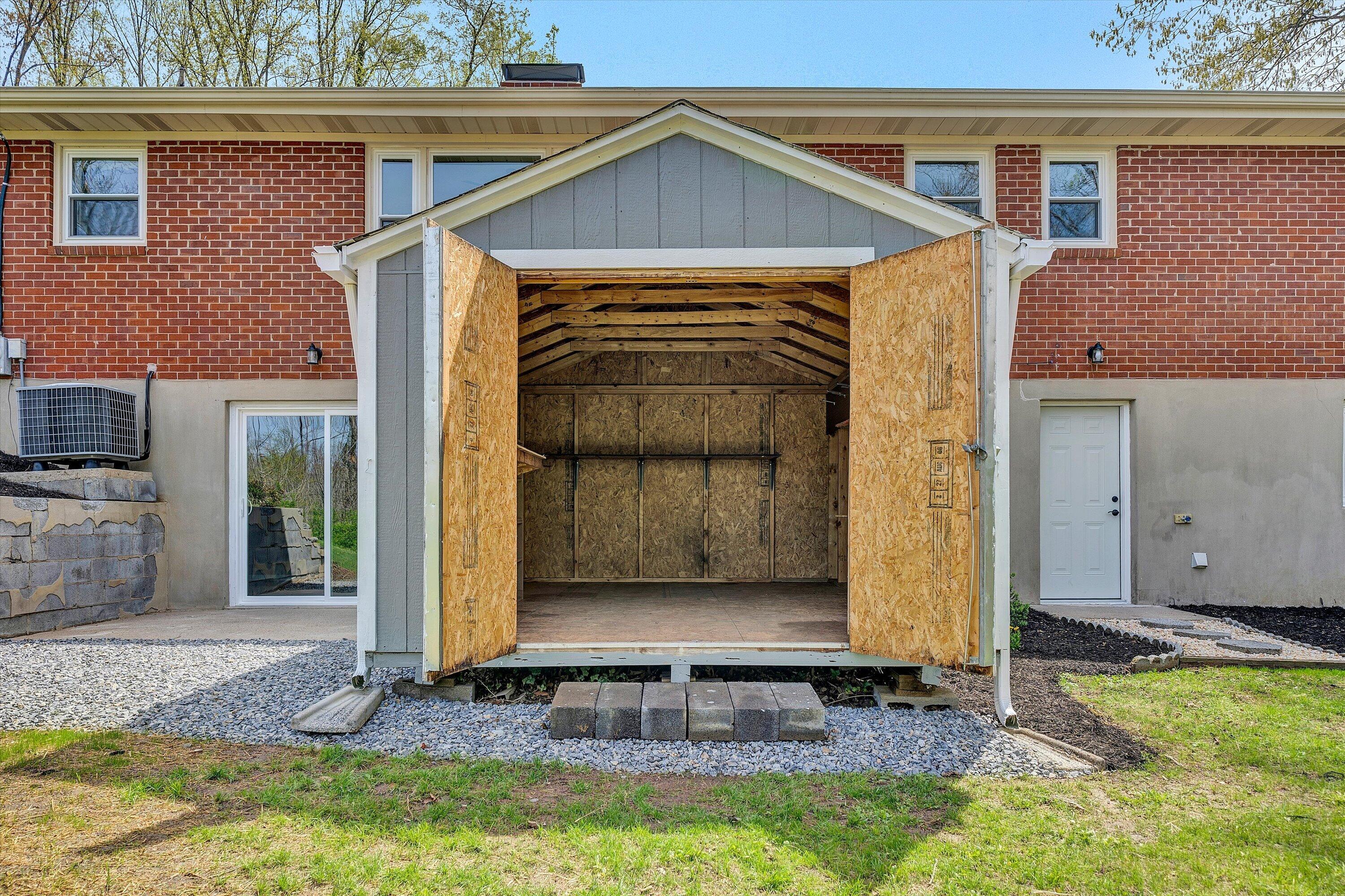731 Bassett Heights Road Bassett, VA 24055 - Photo 37 of 45 a front view of a house with a yard