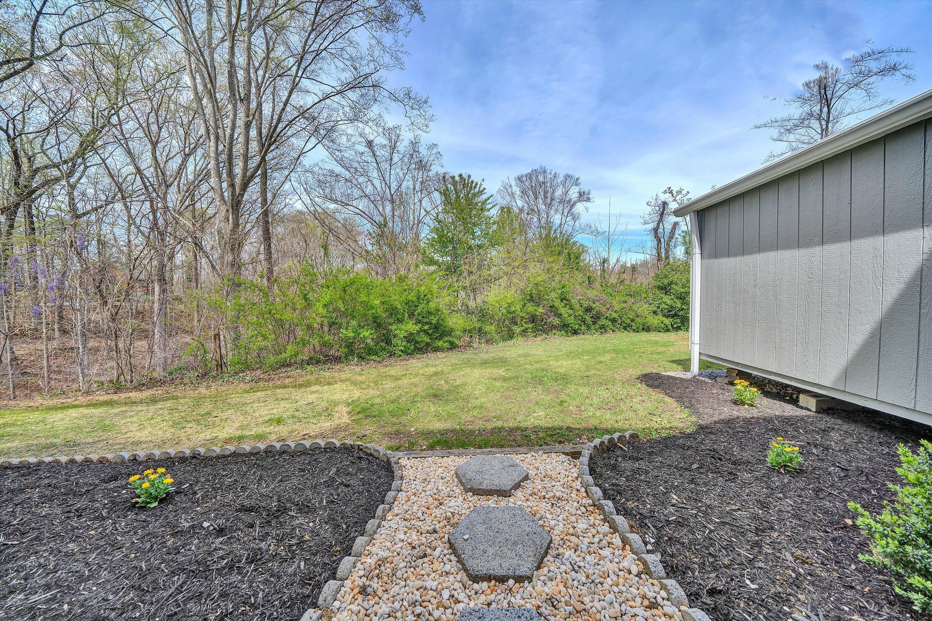 731 Bassett Heights Road Bassett, VA 24055 - Photo 39 of 45 a view of a backyard with large trees