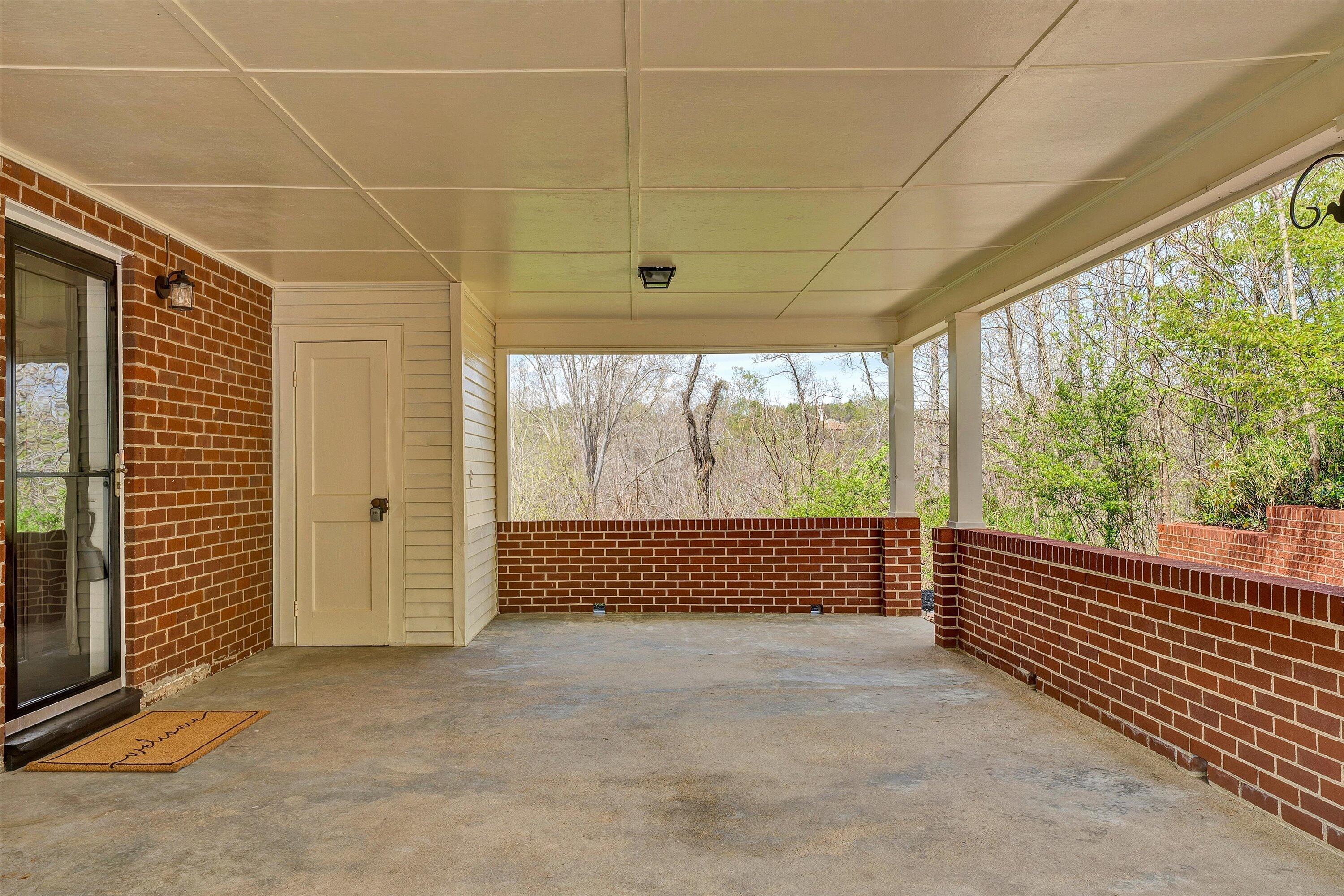 731 Bassett Heights Road Bassett, VA 24055 - Photo 42 of 45 a view of a room with wooden floor and iron stairs