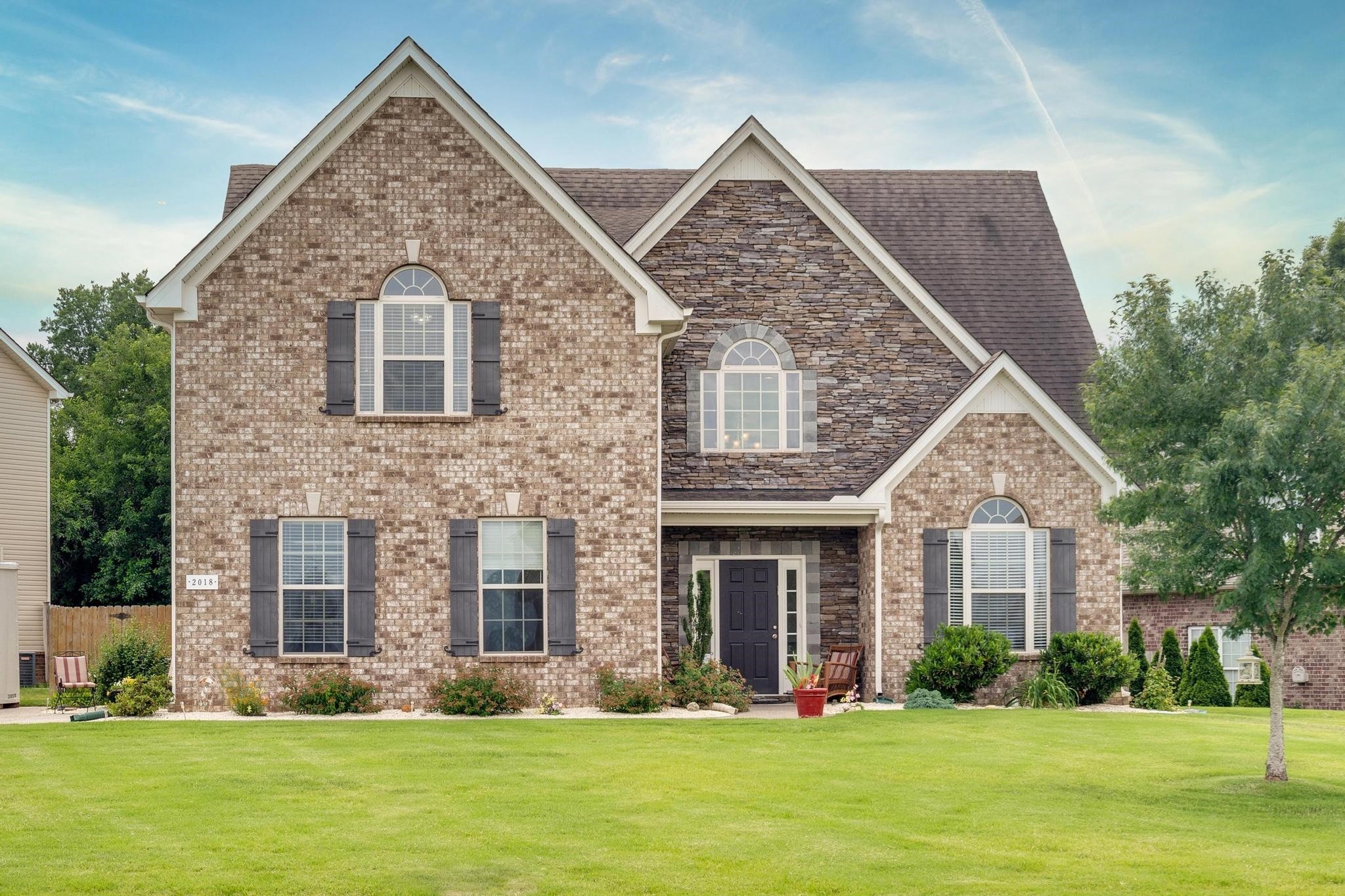 2018 Lincoln Road Spring Hill, TN 37174 - Photo 1 of 32 a front view of house with yard