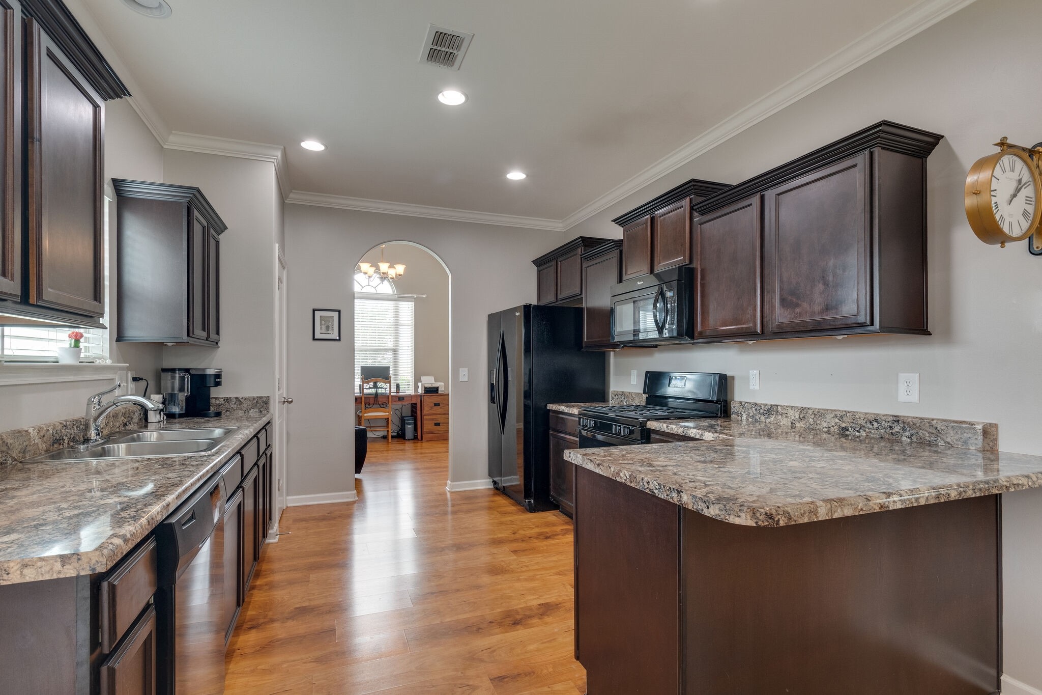 2018 Lincoln Road Spring Hill, TN 37174 - Photo 11 of 32 a kitchen with stainless steel appliances granite countertop a sink stove and refrigerator