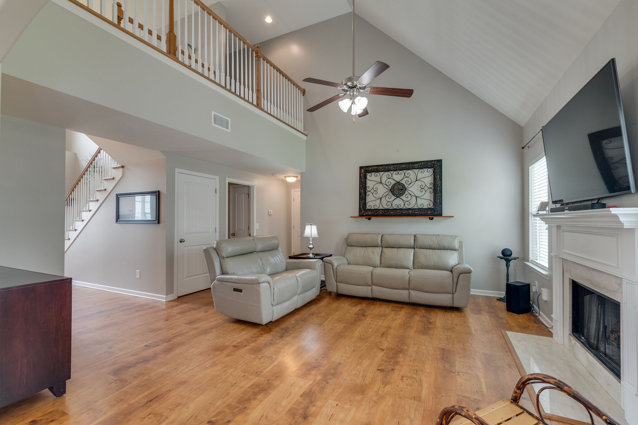 2018 Lincoln Road Spring Hill, TN 37174 - Photo 16 of 32 a living room with furniture and a fireplace