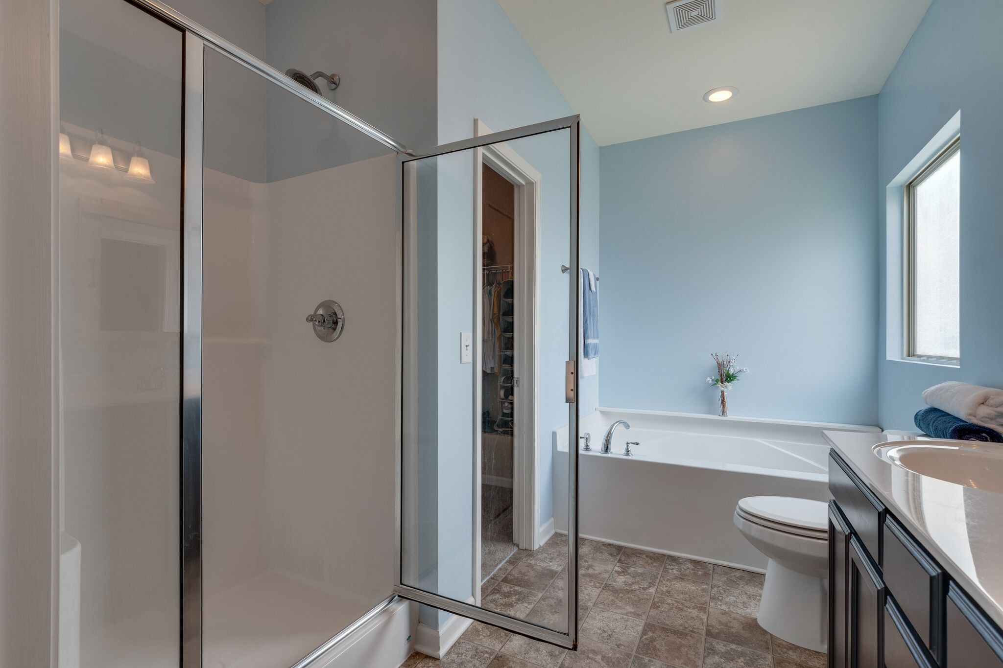 2018 Lincoln Road Spring Hill, TN 37174 - Photo 22 of 32 a bathroom with a bathtub a toilet and a shower
