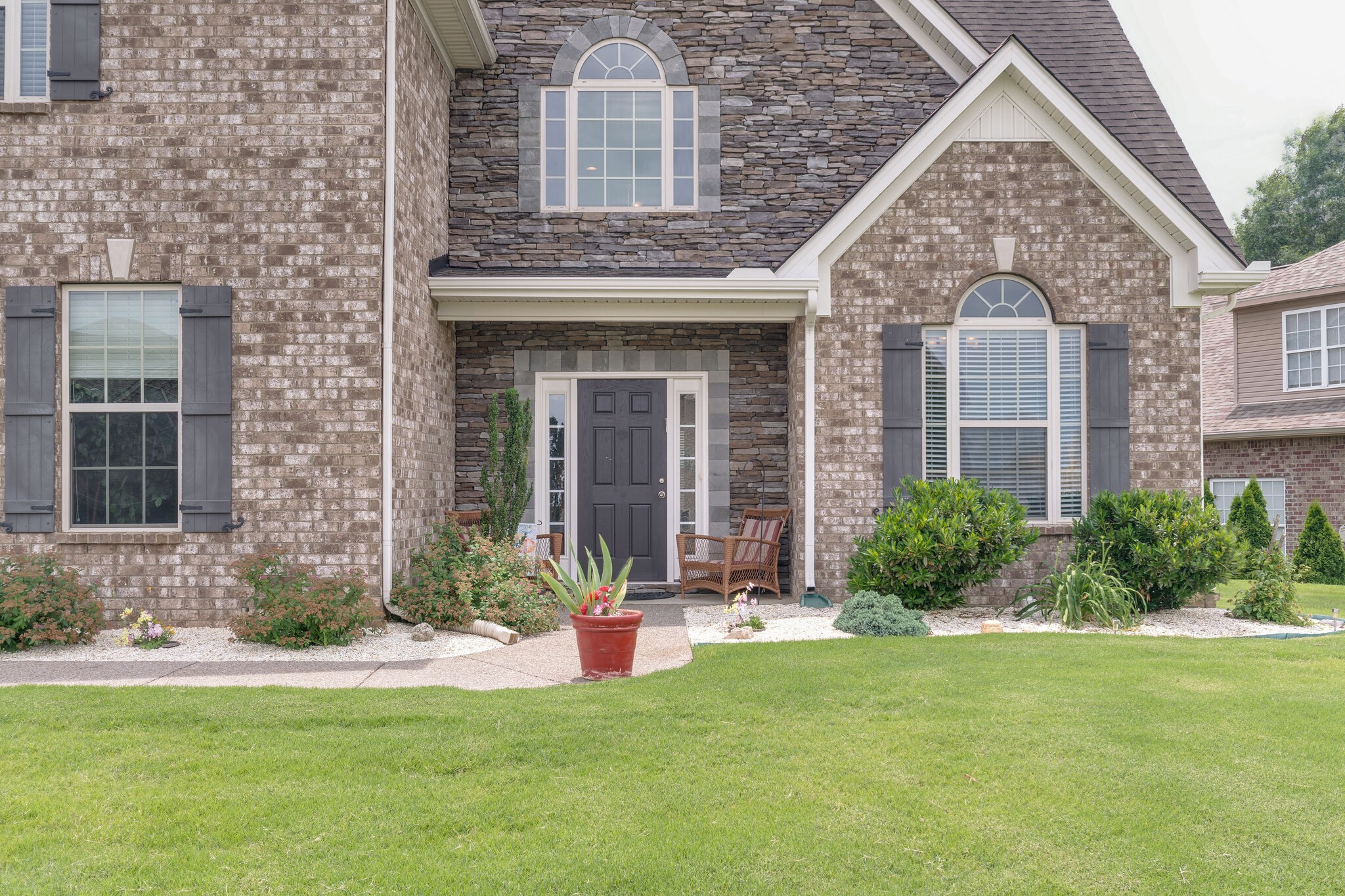 2018 Lincoln Road Spring Hill, TN 37174 - Photo 3 of 32 a front view of a house with a yard and garage