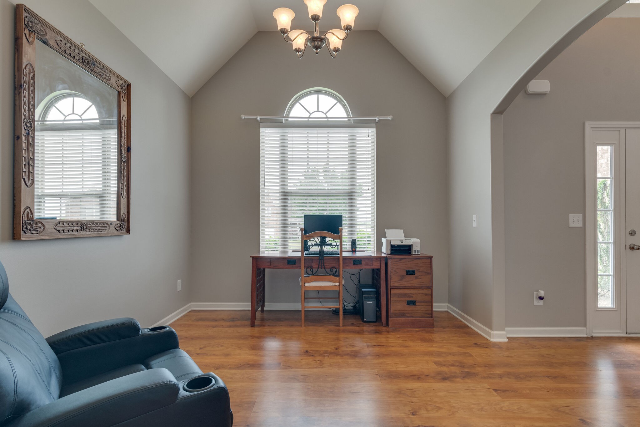 2018 Lincoln Road Spring Hill, TN 37174 - Photo 8 of 32 a living room with furniture and a chandelier