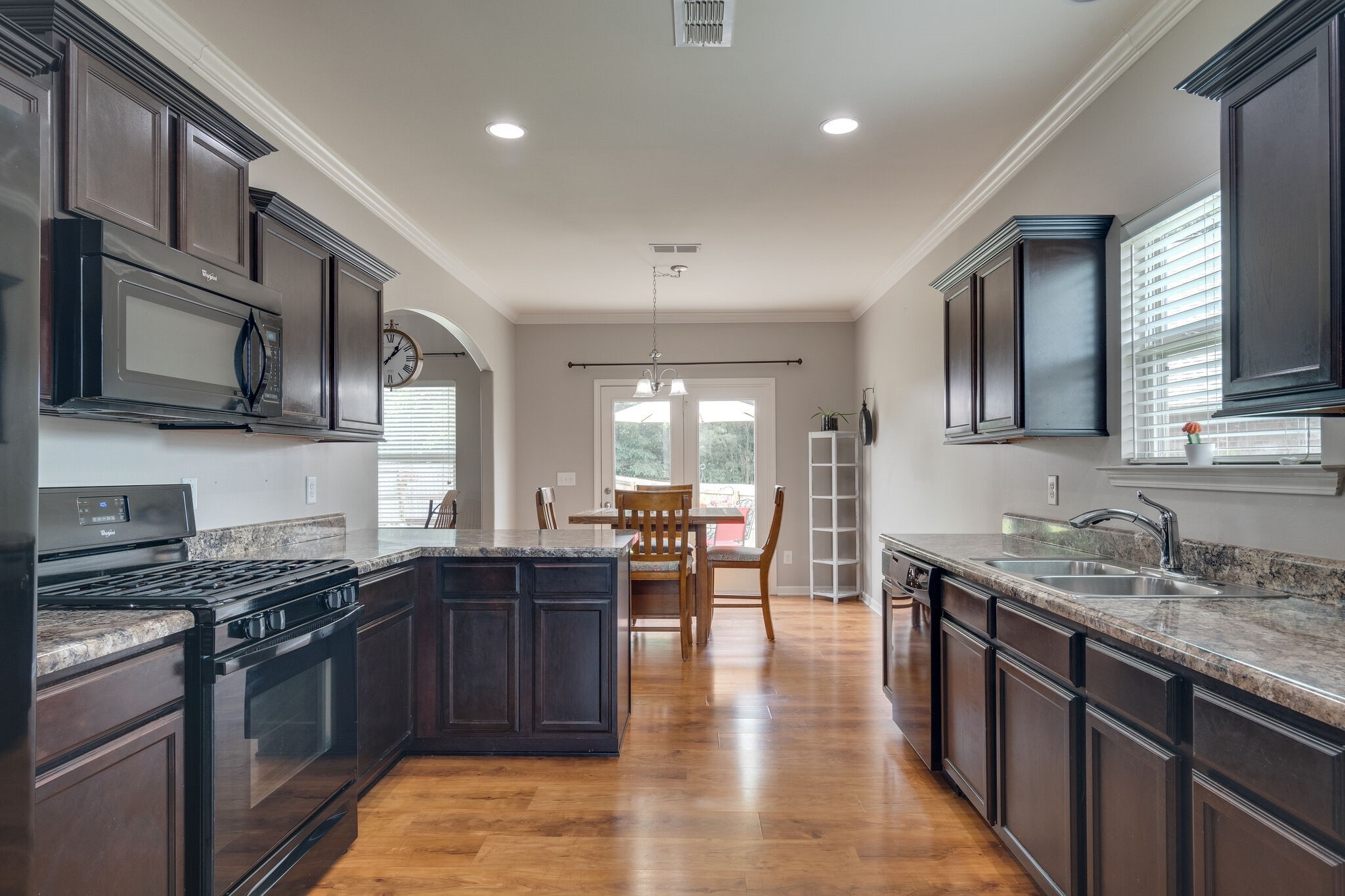 2018 Lincoln Road Spring Hill, TN 37174 - Photo 10 of 32 a kitchen with lots of counter top space a sink appliances and cabinets