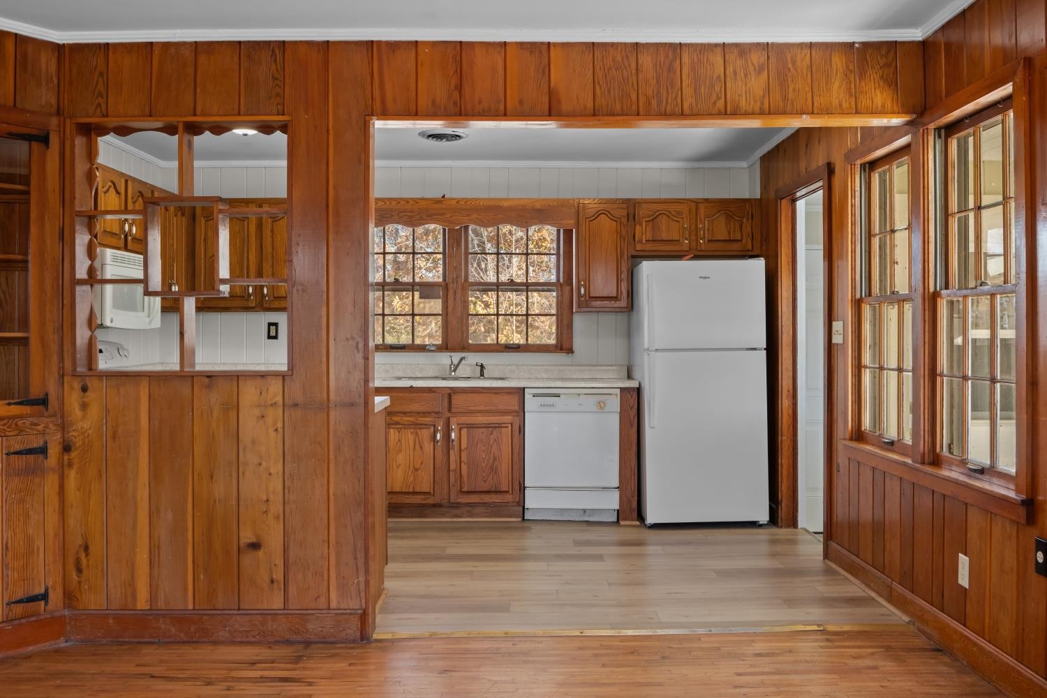 1260 Clydeton Road Waverly, TN 37185 - Photo 13 of 41 a view of a kitchen with a refrigerator and wooden floor