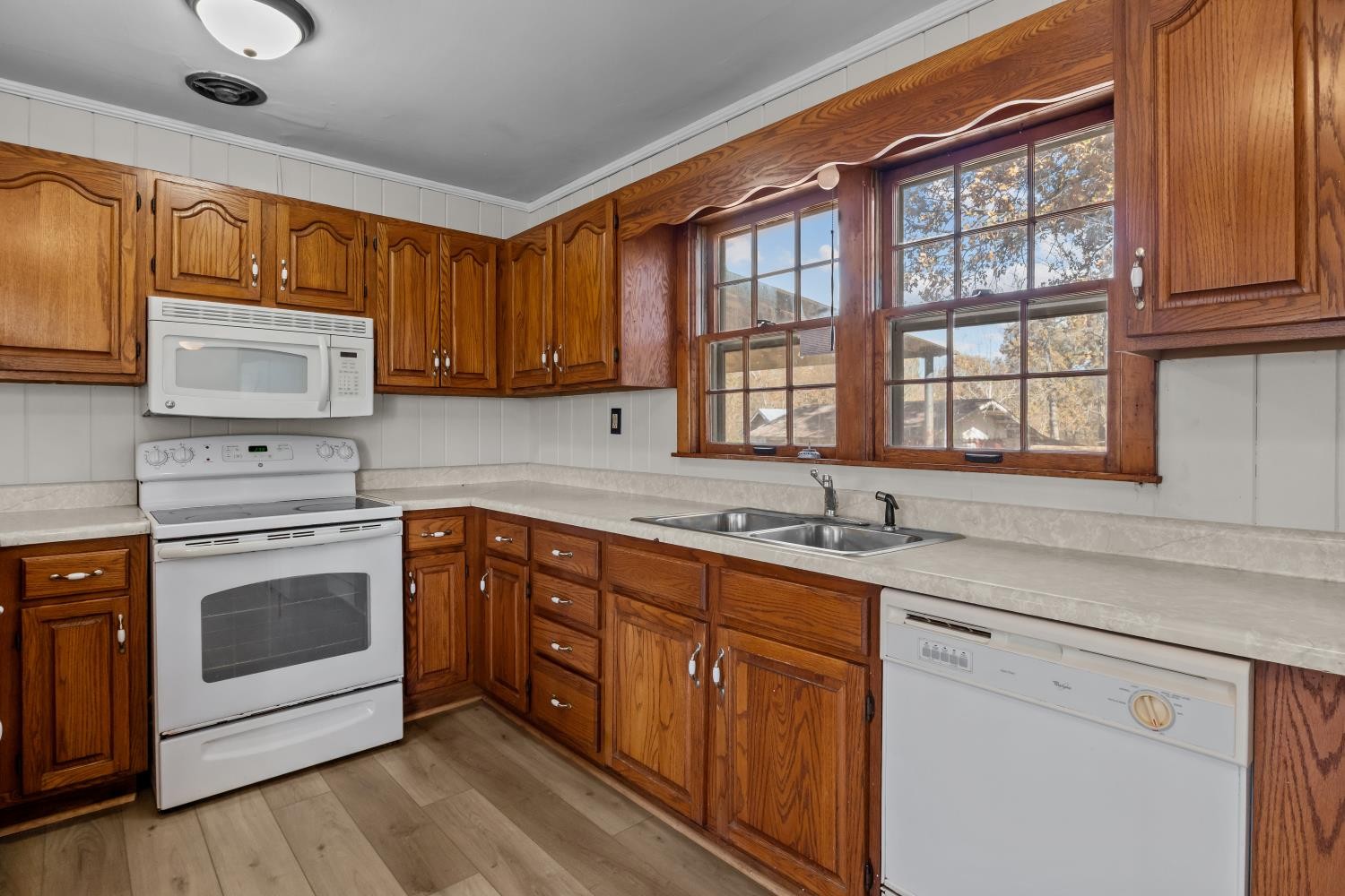 1260 Clydeton Road Waverly, TN 37185 - Photo 15 of 41 a kitchen with stainless steel appliances granite countertop a stove sink and cabinets