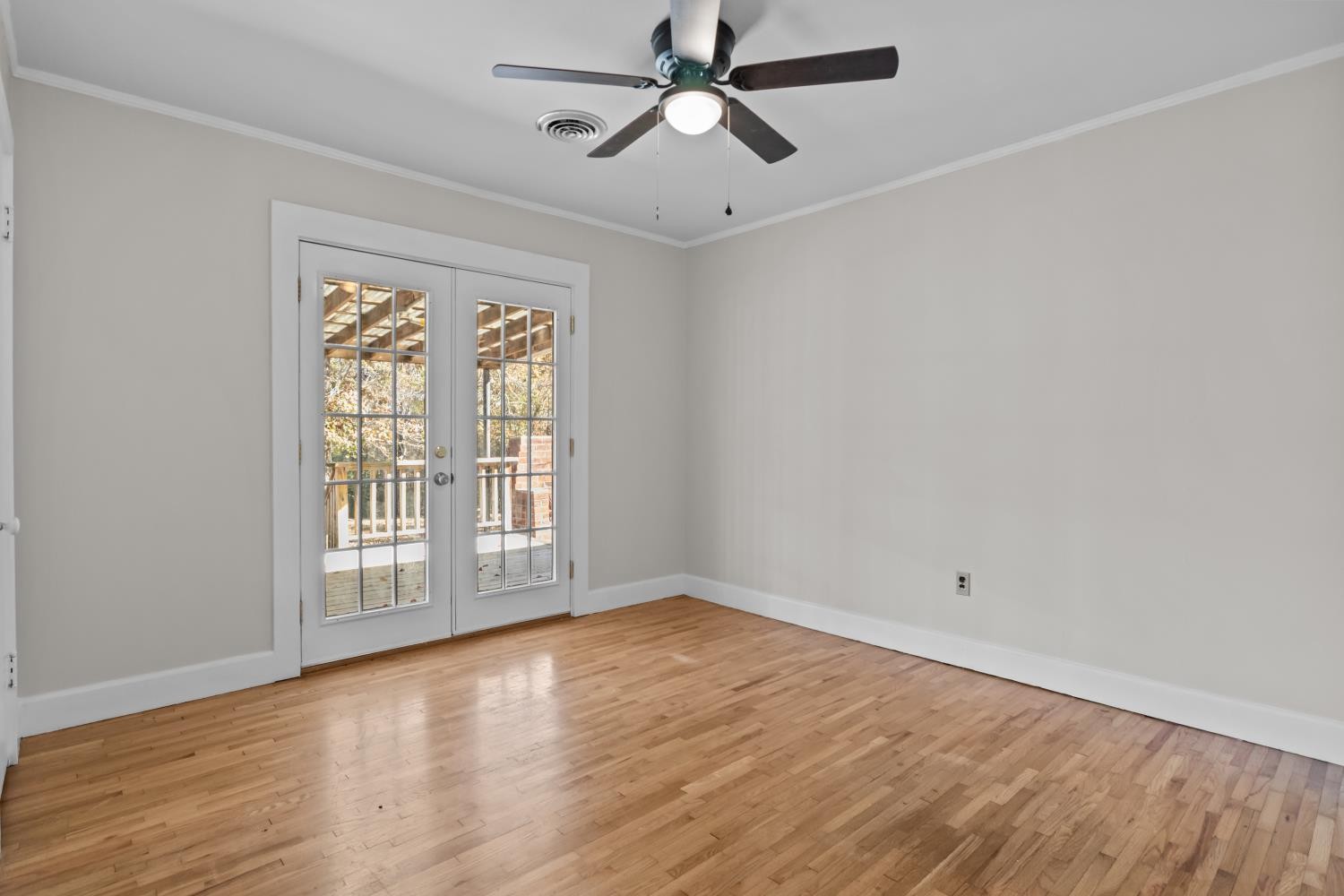 1260 Clydeton Road Waverly, TN 37185 - Photo 22 of 41 wooden floor in an empty room with a window