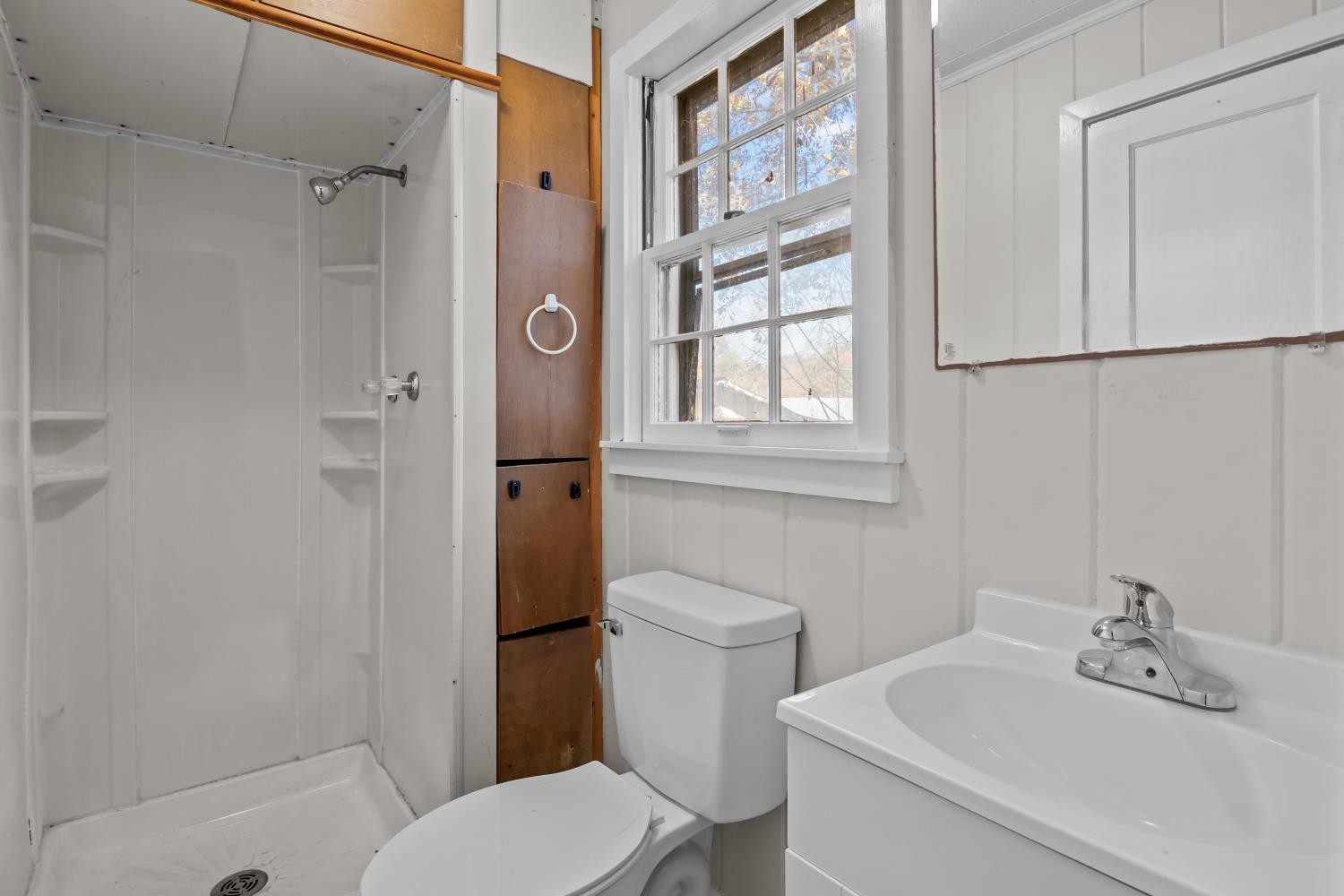 1260 Clydeton Road Waverly, TN 37185 - Photo 24 of 41 a bathroom with a sink toilet and shower