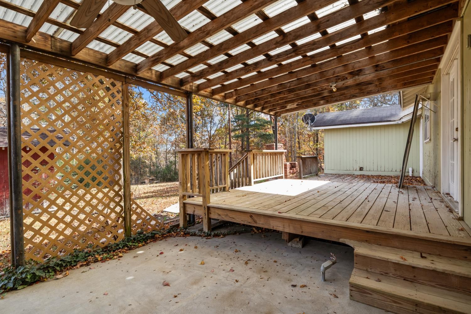 1260 Clydeton Road Waverly, TN 37185 - Photo 29 of 41 a bedroom with a bed and a table