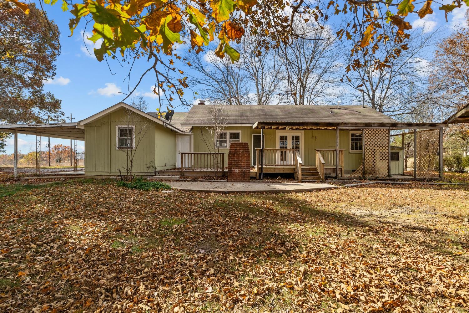 1260 Clydeton Road Waverly, TN 37185 - Photo 39 of 41 a front view of a house with a garden