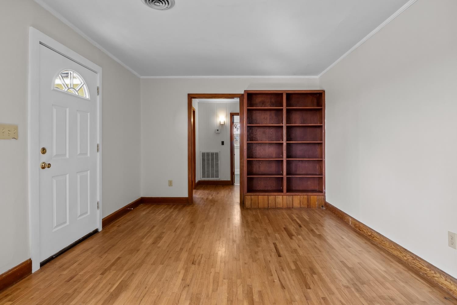 1260 Clydeton Road Waverly, TN 37185 - Photo 5 of 41 wooden floor in an empty room with a window