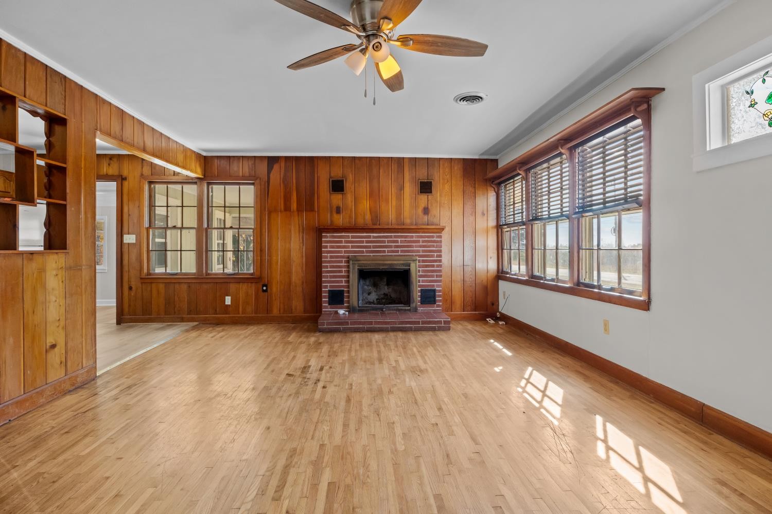 1260 Clydeton Road Waverly, TN 37185 - Photo 9 of 41 a view of an empty room with window and fire place
