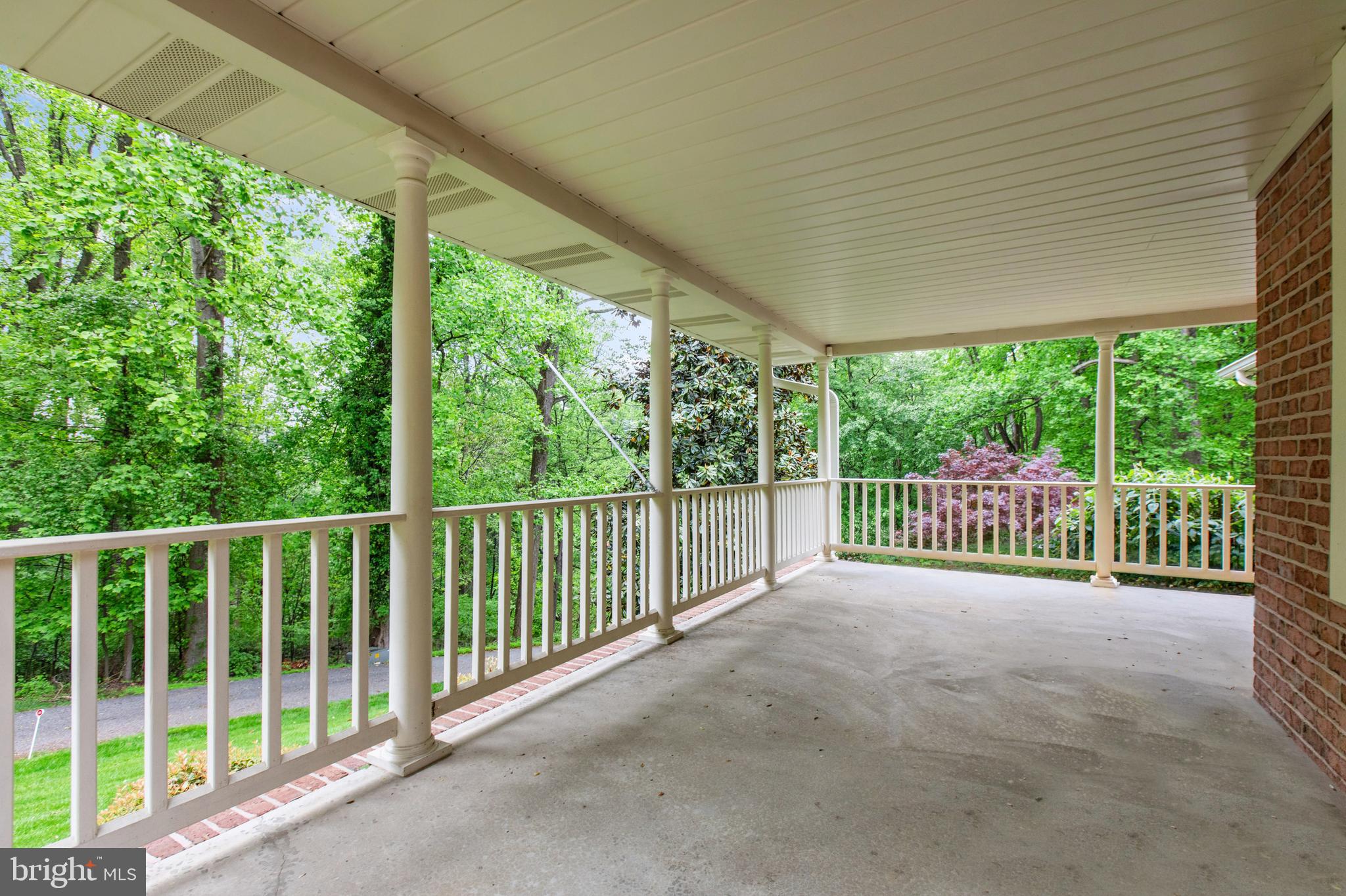 5602 Patterson Road Baldwin, MD 21013 - Photo 28 of 88 a view of a deck with a floor to ceiling window and wooden fence