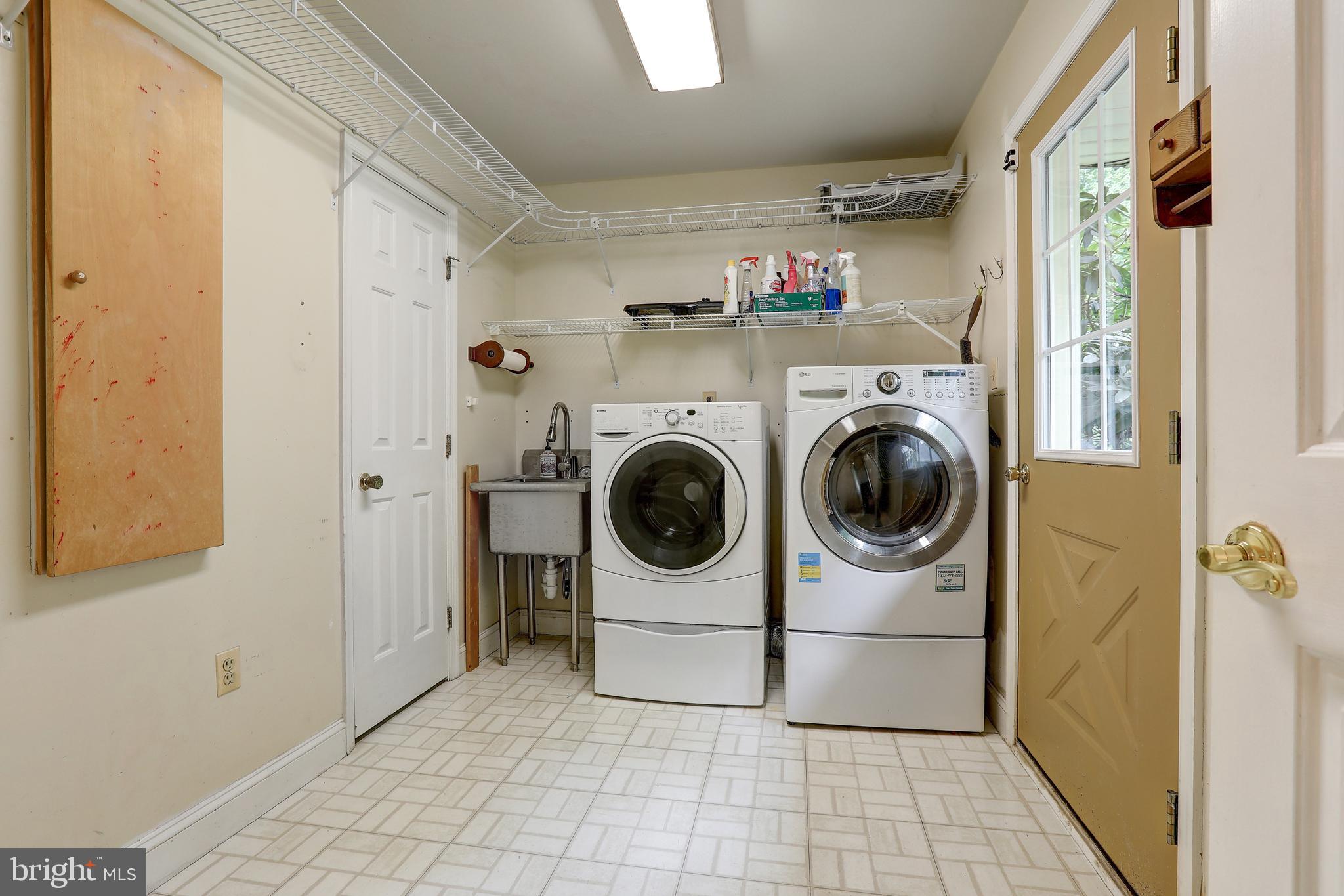 5602 Patterson Road Baldwin, MD 21013 - Photo 58 of 88 a utility room with dryer and washer