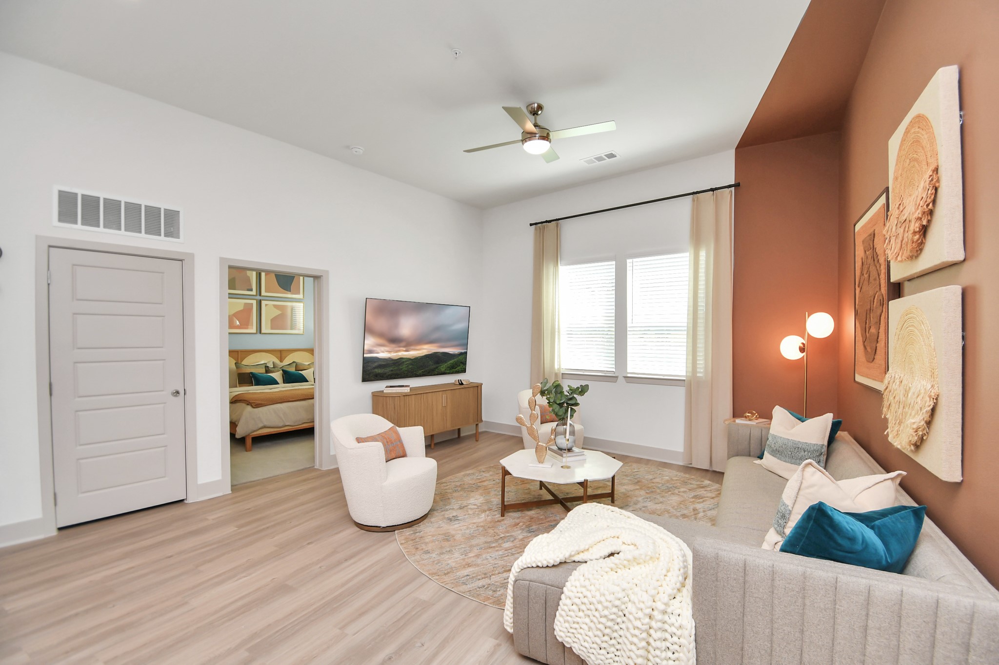 1617 Enid Street, Unit 177 Houston, TX 77009 - Photo 10 of 50 a living room with furniture and a flat screen tv