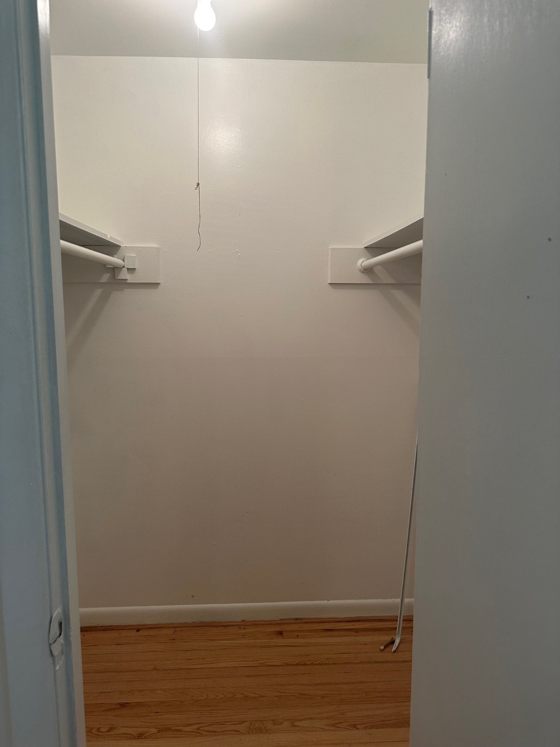 6003 Heatherbrook Drive Houston, TX 77085 - Photo 11 of 13 a view of small space with racks on the wall