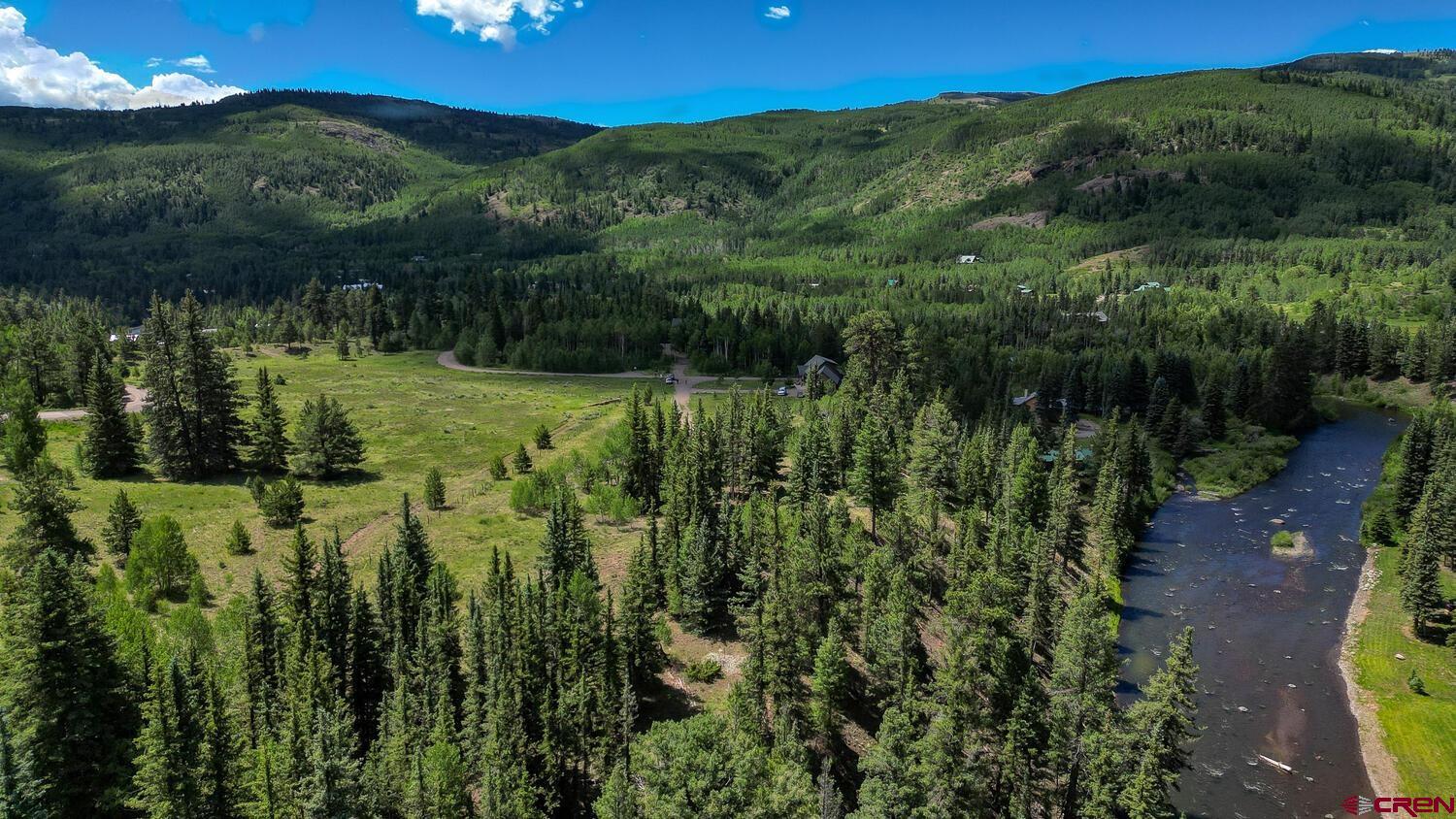 Lot 3 North N Ridge Antonito, CO 81120 - Photo 32 of 35 a view of a lush green forest with mountains in the background