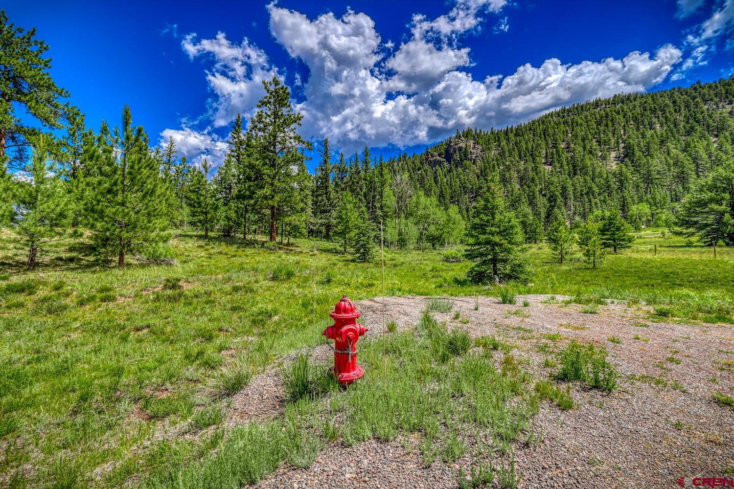 Lot 3 North N Ridge Antonito, CO 81120 - Photo 6 of 35 a view of a pathway with a house in a yard