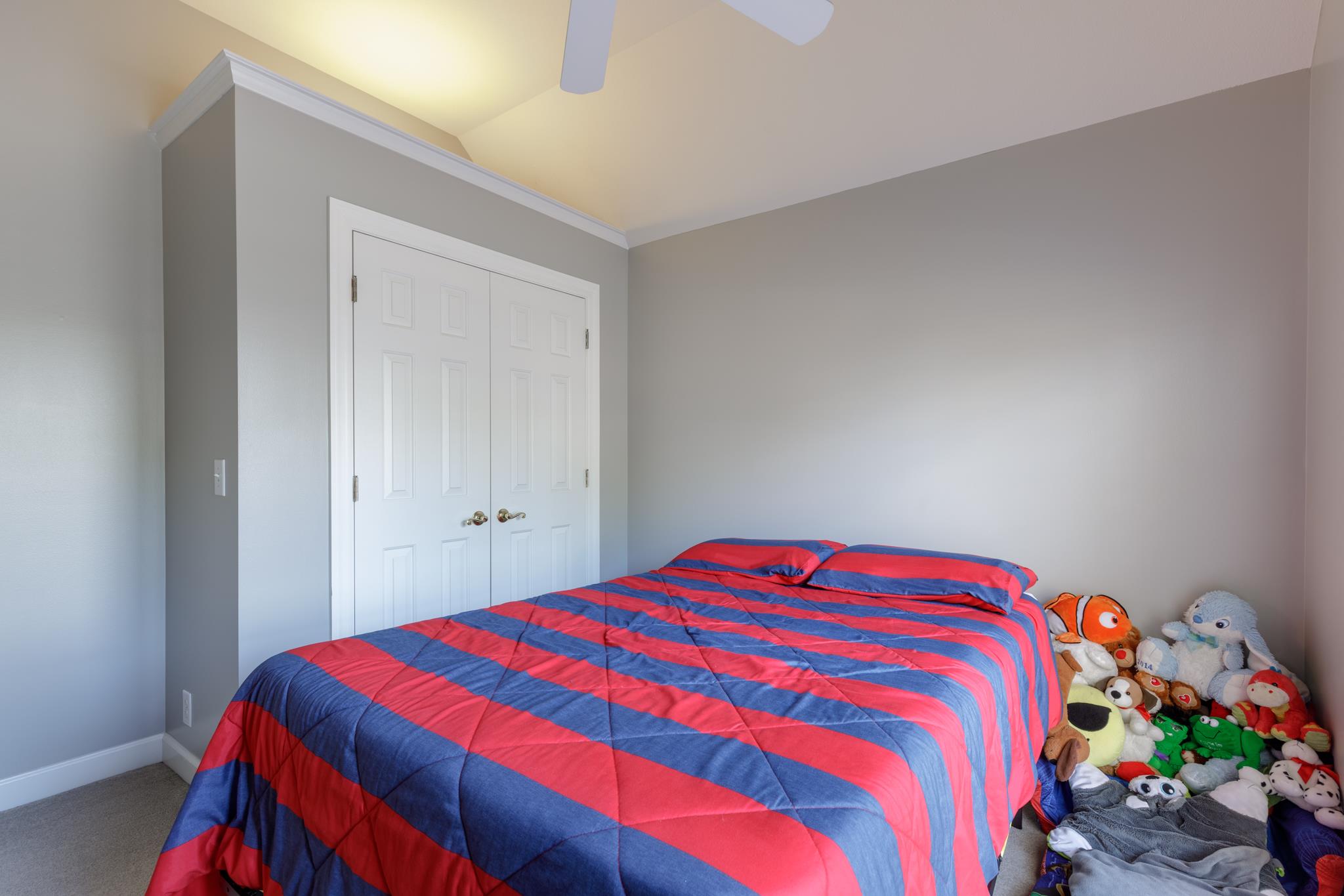 214 Savannah Ridge Murfreesboro, TN 37127 - Photo 15 of 30 Another view of Bedroom #2 with double closet! 214 Savannah Ridge, Murfreesboro, TN 37127