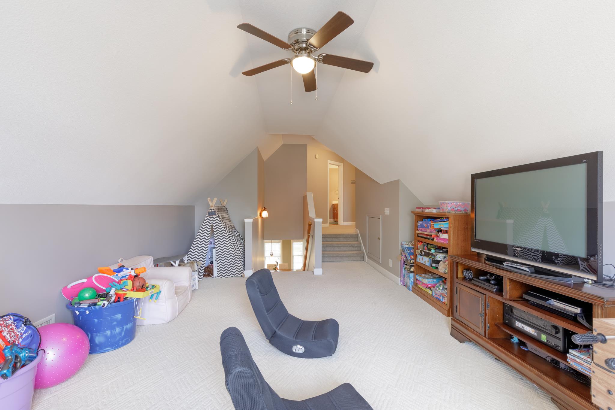 214 Savannah Ridge Murfreesboro, TN 37127 - Photo 20 of 30 Bonus room has a cathedral ceiling with ceiling fan! 214 Savannah Ridge, Murfreesboro, TN 37127