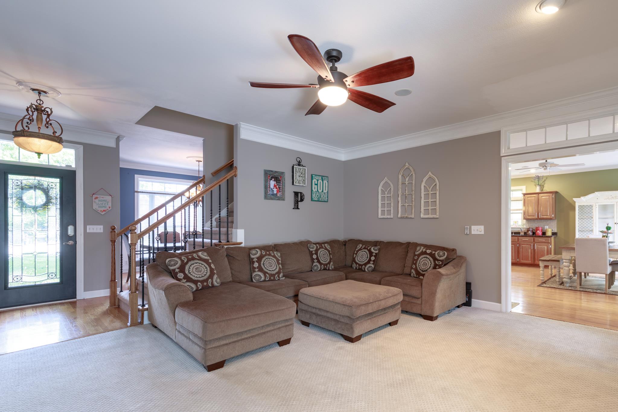 214 Savannah Ridge Murfreesboro, TN 37127 - Photo 4 of 30 The living room has neutral colors, upgraded berber carpet, lots of trim work, recessed lighting and a ceiling fan! 214 Savannah Ridge, Murfreesboro, TN 37127