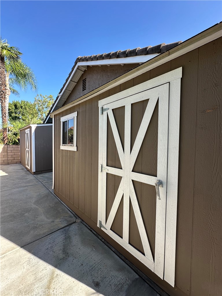 6707 Rycroft Drive Riverside, CA 92506 - Photo 17 of 41 a front view of a house with wooden fence