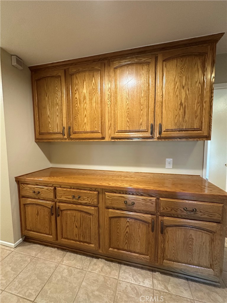 6707 Rycroft Drive Riverside, CA 92506 - Photo 19 of 41 a view of a kitchen with washer and dryer