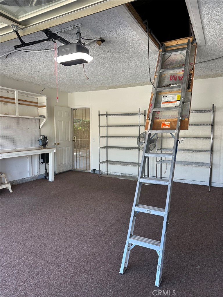 6707 Rycroft Drive Riverside, CA 92506 - Photo 37 of 41 a view of room with stairs