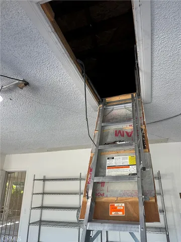 a view of swimming pool with an outdoor seating