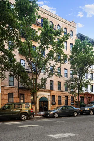 a utility room with a white wall washer and dryer