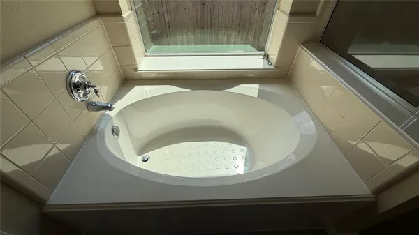 a bathroom with a bathtub