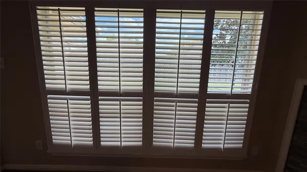 a view of a bedroom with a window