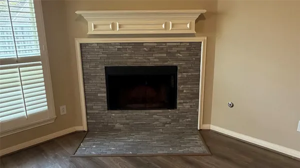 a living room with a fireplace
