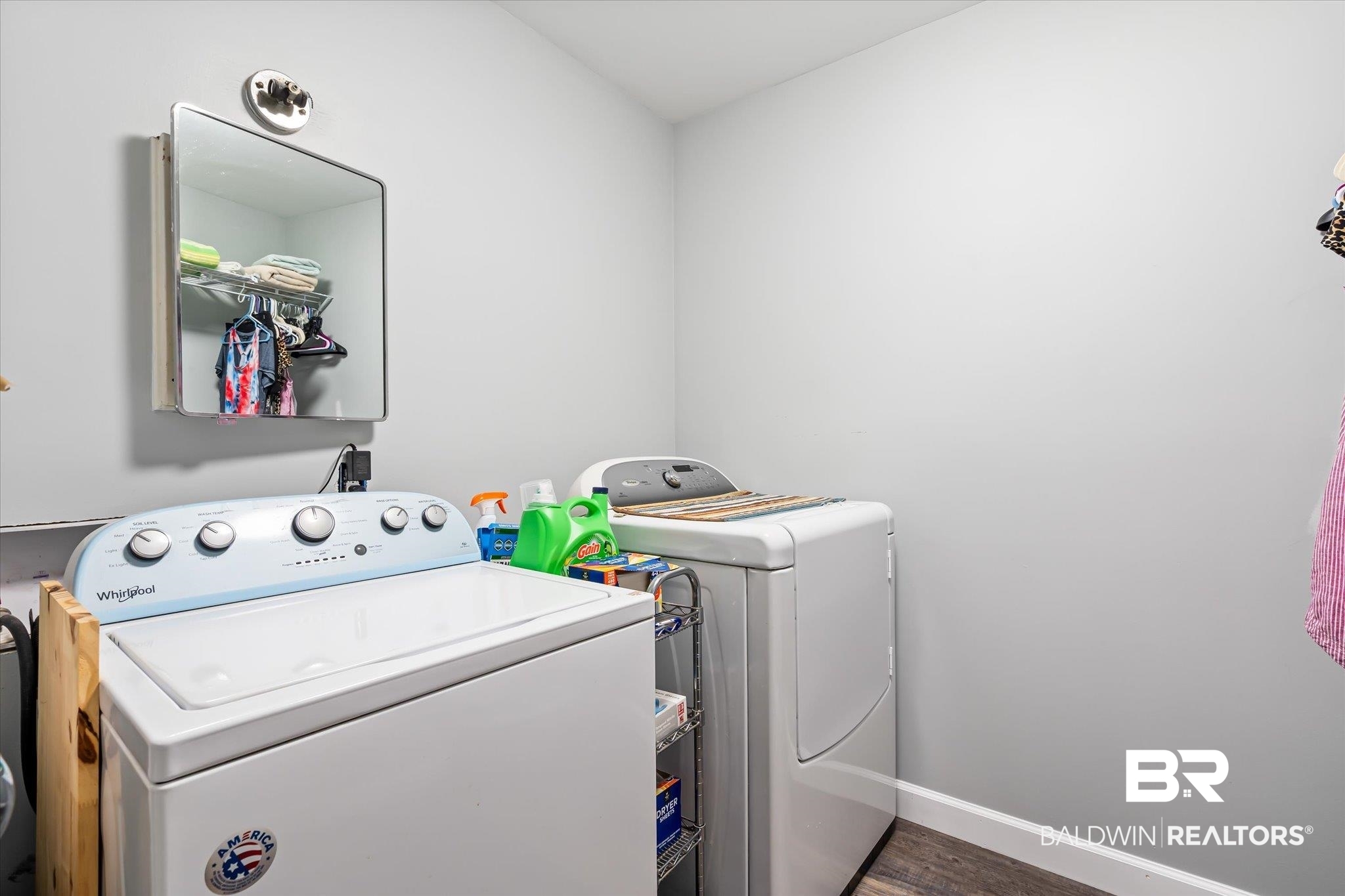 10391 County Road 64 Daphne, AL 36526 - Photo 16 of 23 Laundry area with dark wood-type flooring and washer and dryer