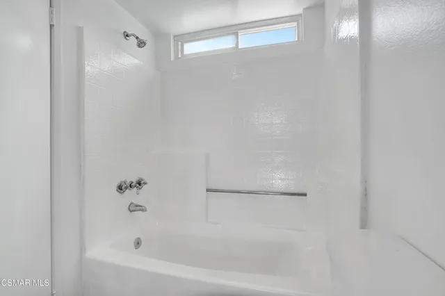 a close up of a bathtub