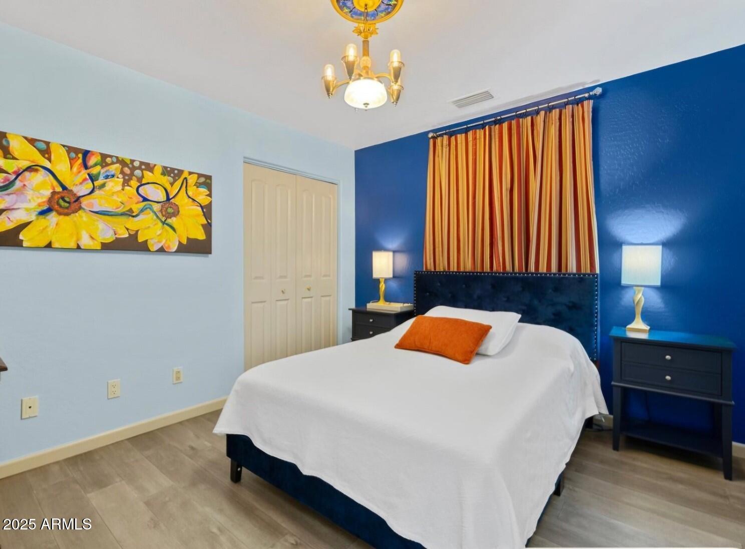 4580 East Steven Way Rimrock, AZ 86335 - Photo 11 of 17 a bedroom with a bed and a lamp