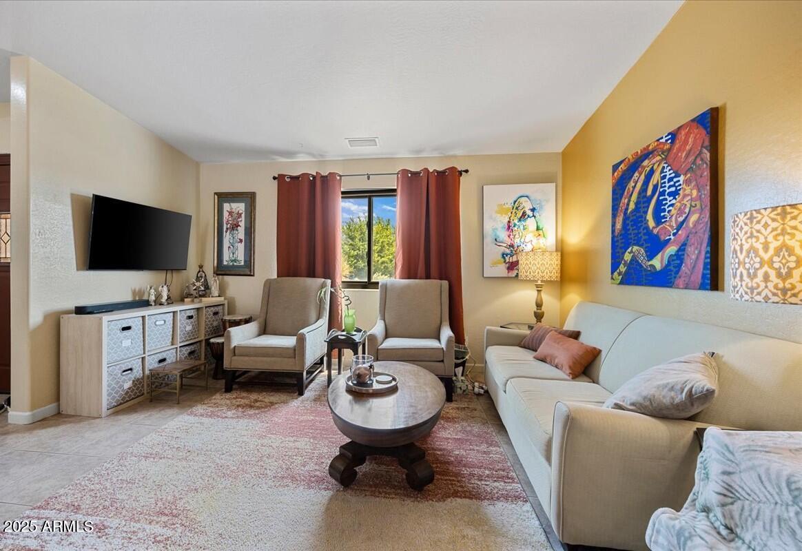 4580 East Steven Way Rimrock, AZ 86335 - Photo 4 of 17 a living room with furniture and a flat screen tv