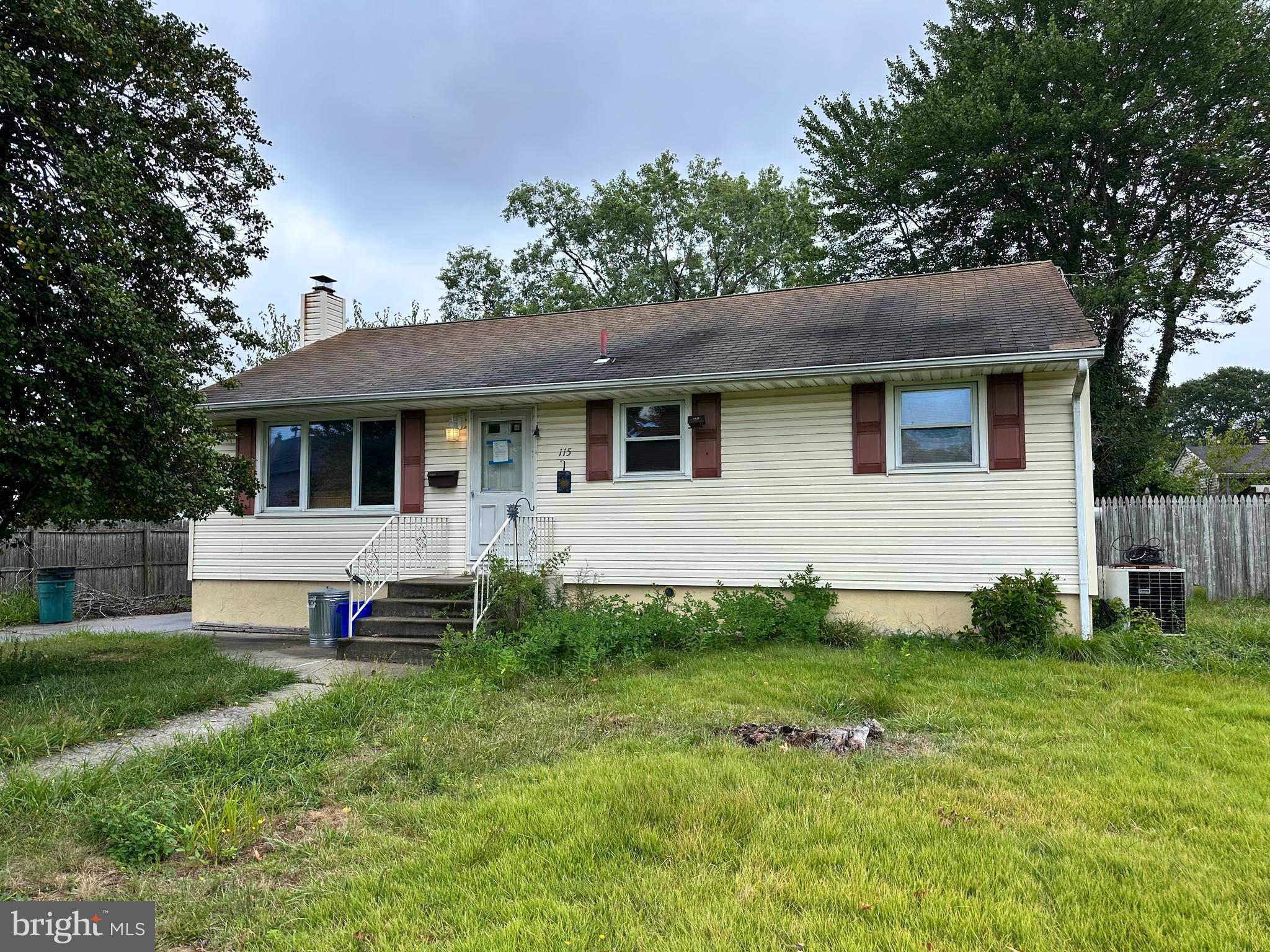 115 Gloucester Avenue Magnolia, NJ 08049 - Photo 1 of 2 a view of a house with a yard and sitting area