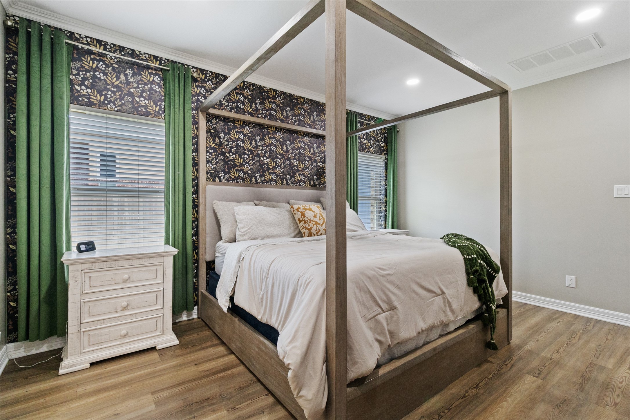7927 Needlepoint Road Baytown, TX 77521 - Photo 17 of 46 a bedroom with a bed and a window