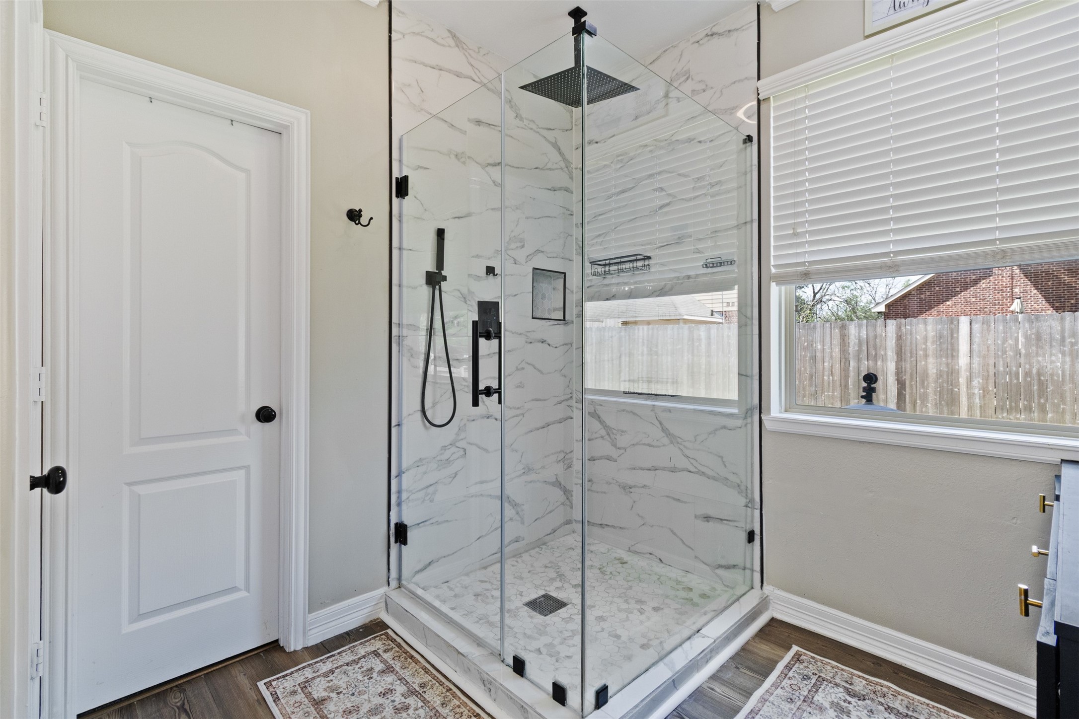 7927 Needlepoint Road Baytown, TX 77521 - Photo 19 of 46 a bathroom with a shower