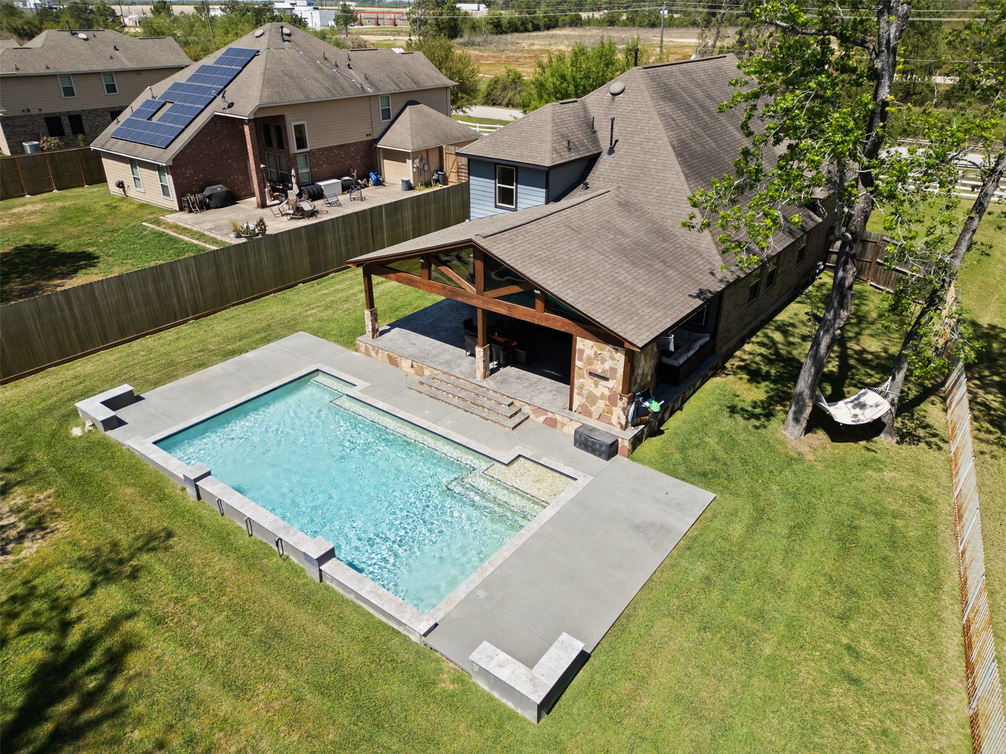 7927 Needlepoint Road Baytown, TX 77521 - Photo 2 of 46 an aerial view of a house having patio