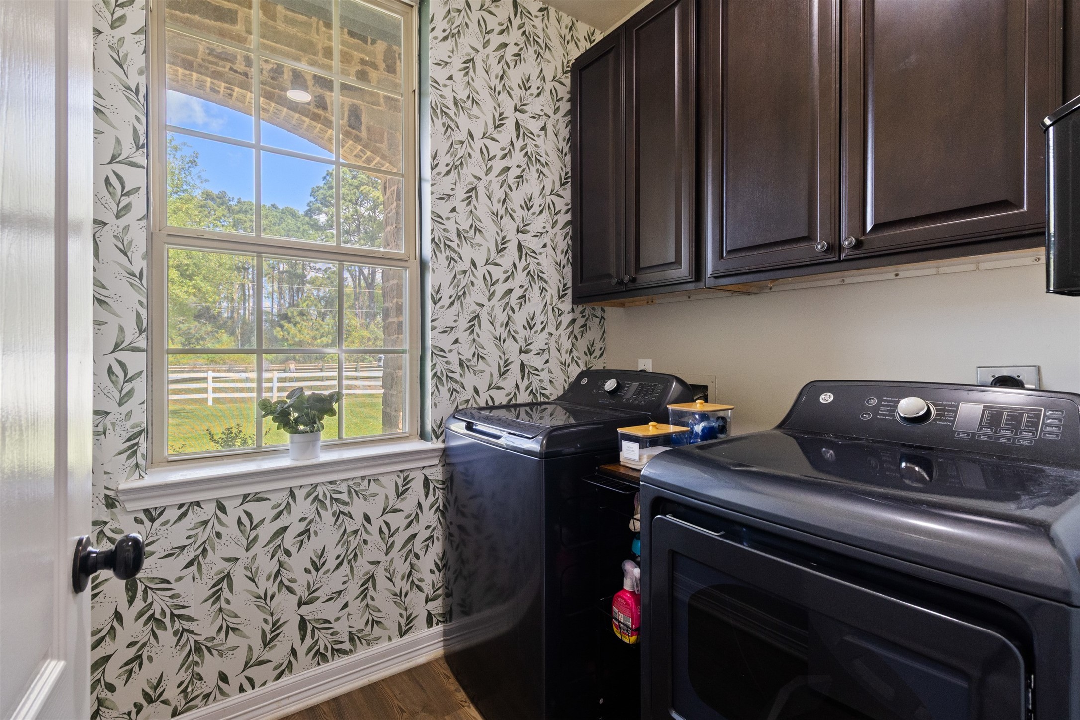 7927 Needlepoint Road Baytown, TX 77521 - Photo 22 of 46 a kitchen with a stove and a microwave