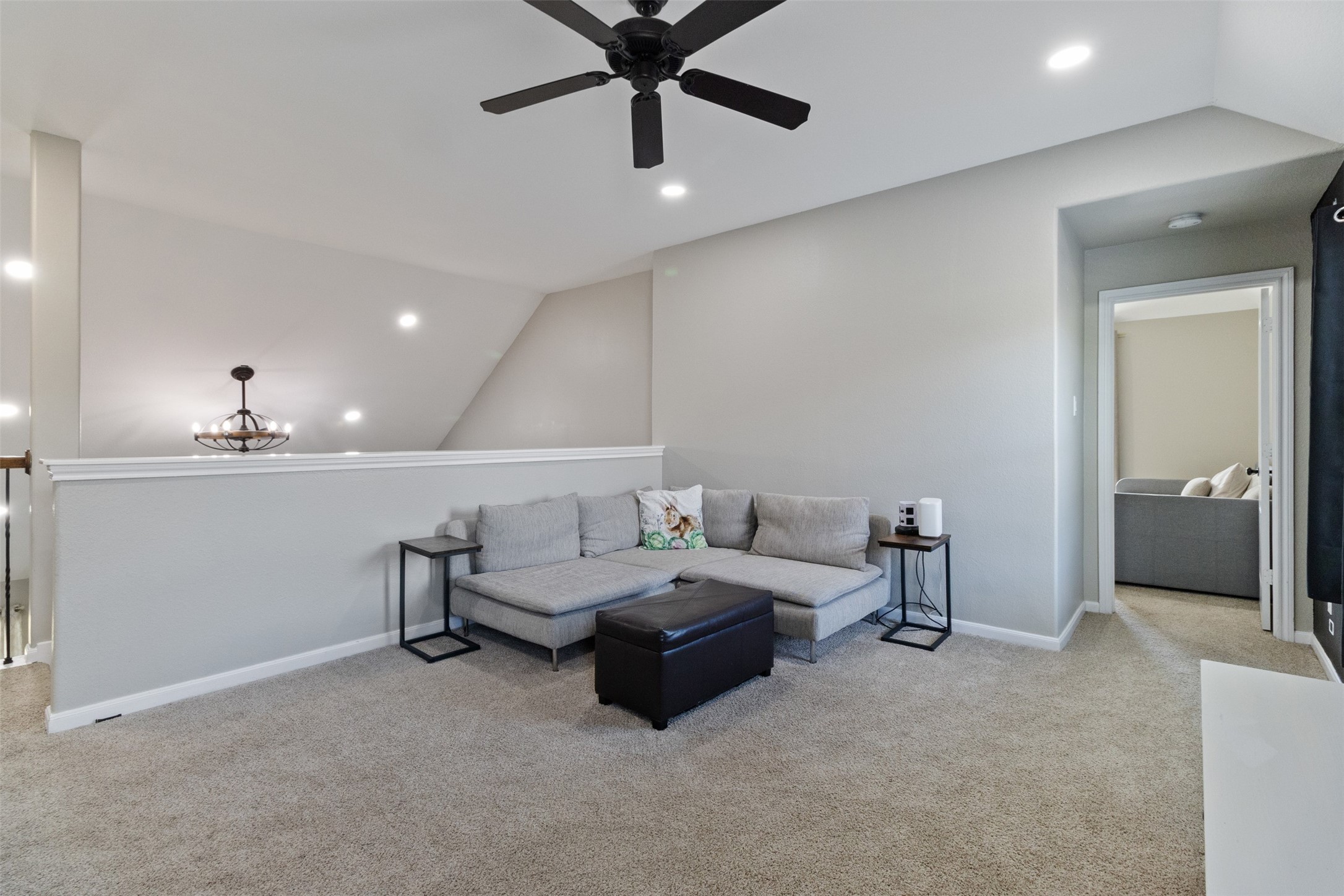 7927 Needlepoint Road Baytown, TX 77521 - Photo 24 of 46 a living room with furniture and a ceiling fan