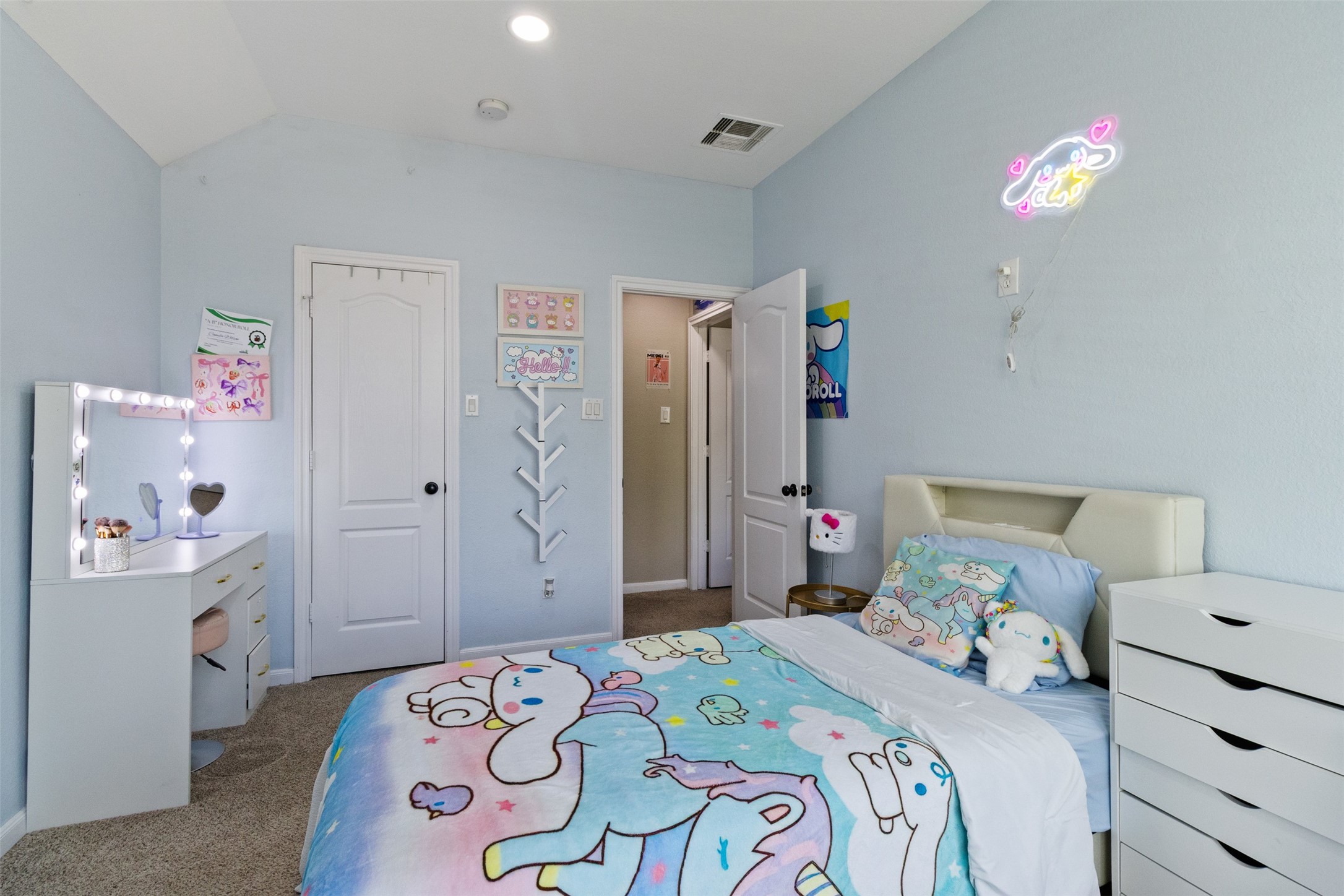 7927 Needlepoint Road Baytown, TX 77521 - Photo 28 of 46 a bedroom with a bed and a dresser in it