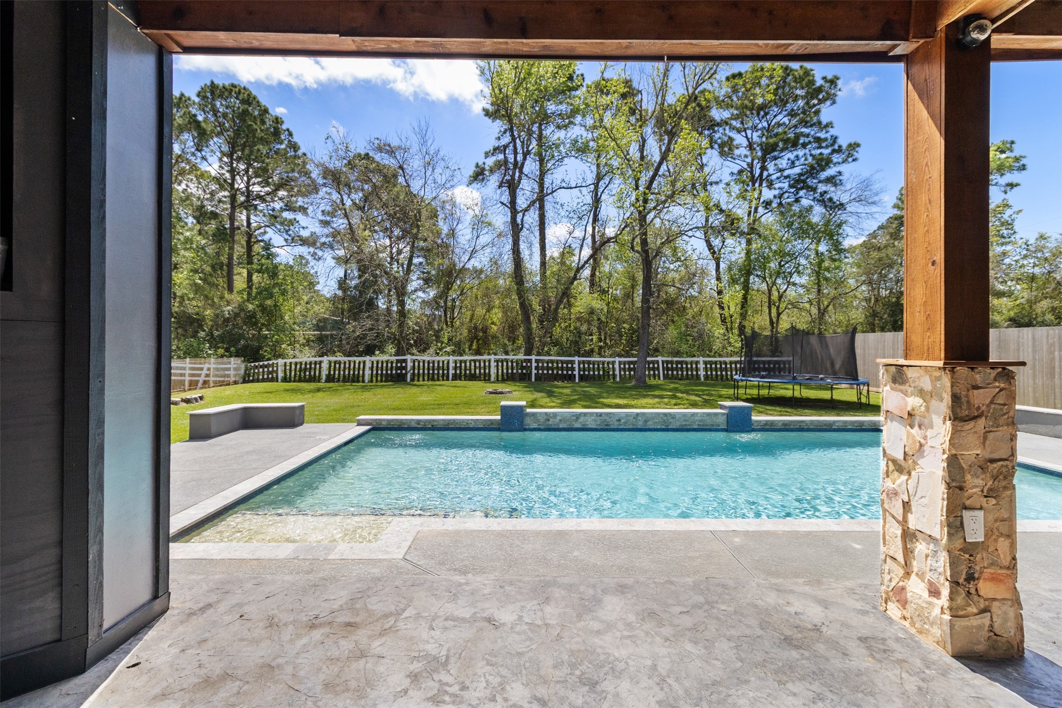 7927 Needlepoint Road Baytown, TX 77521 - Photo 32 of 46 a view of a yard with a swimming pool